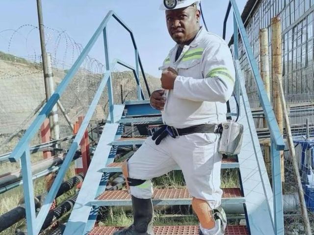 Founder in uniform on stairs
